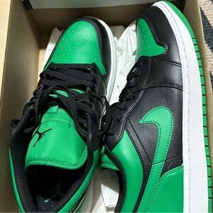 Black and green Jordan lows. Men 10 for women who wear size 11 or 11 1/2